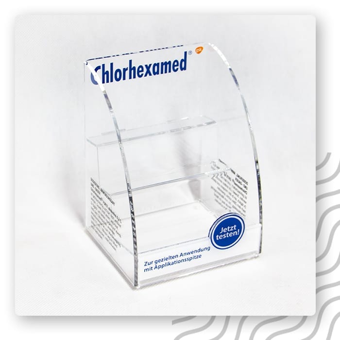 Przezroczysty ekspozytor z plexi na ulotki z logo Chlorhexamed na froncie