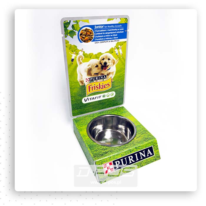 Zielony ekspozytor POS z logo Purina, zdjęciem psów i metalową miską
