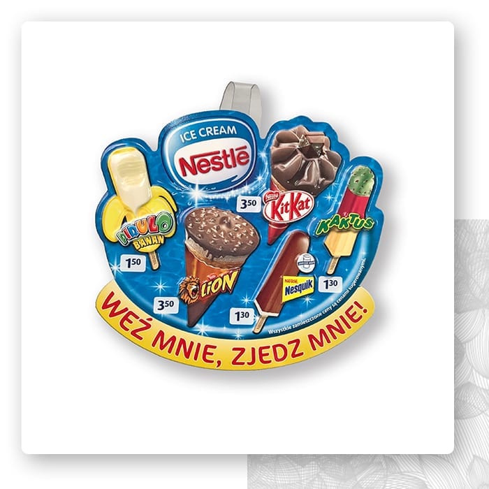 Wobbler w kształcie chmurki z logo Nestlé i hasłem Weź mnie, zjedz mnie